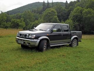Transport uszkodzonego Pickupa -Nissan Navara